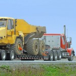 Need to ship heavy equipment in Alberta and outside Alberta ?
